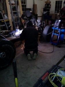 there he is, welding.